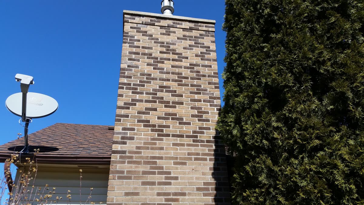 Full brick chimney rebuild — Keystone Masonry Rochester NY