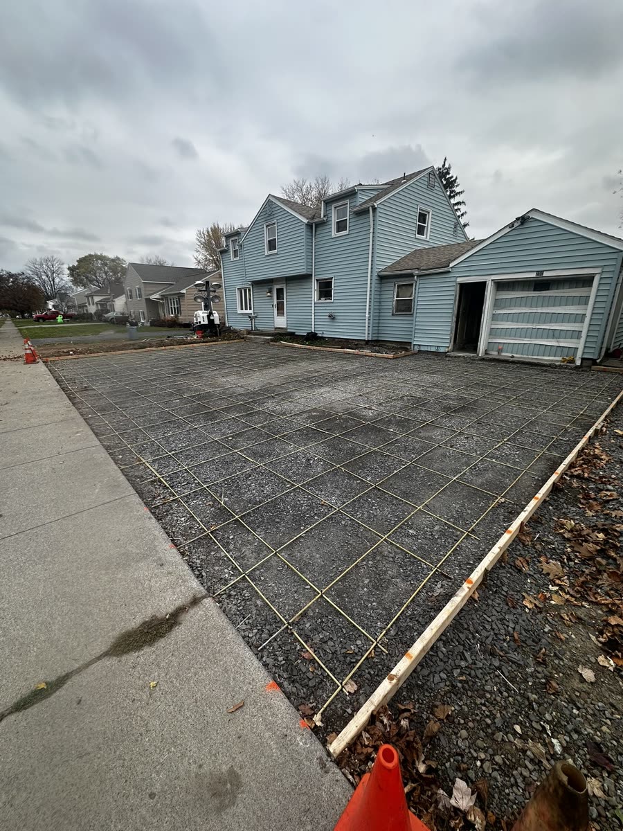 Broom finish applied to new concrete driveway — Keystone Masonry Rochester NY