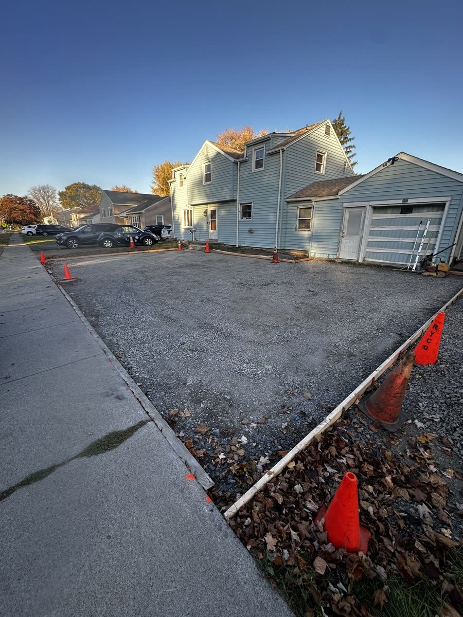 Fresh concrete pour in progress, residential driveway — Rochester NY