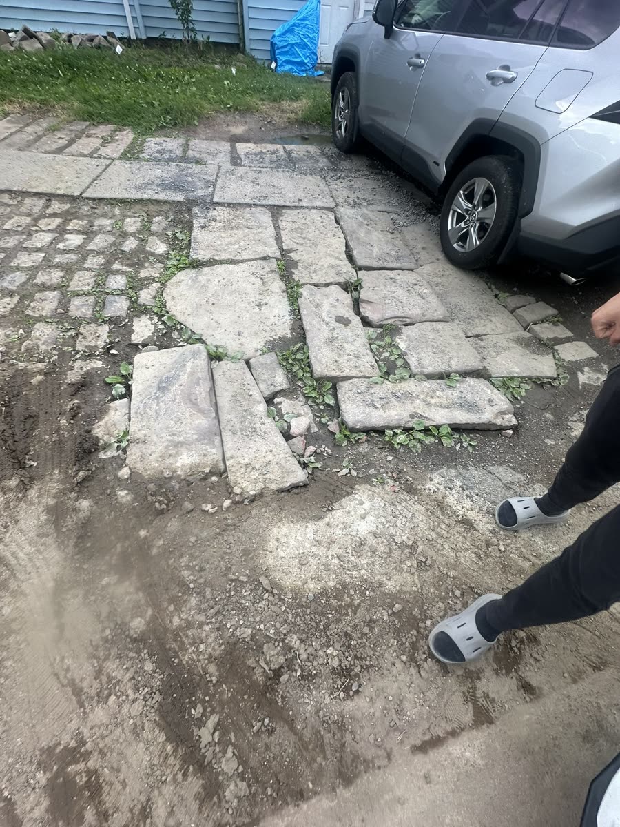 Gravel sub-base compacted and leveled before concrete pour — Keystone Masonry Rochester NY