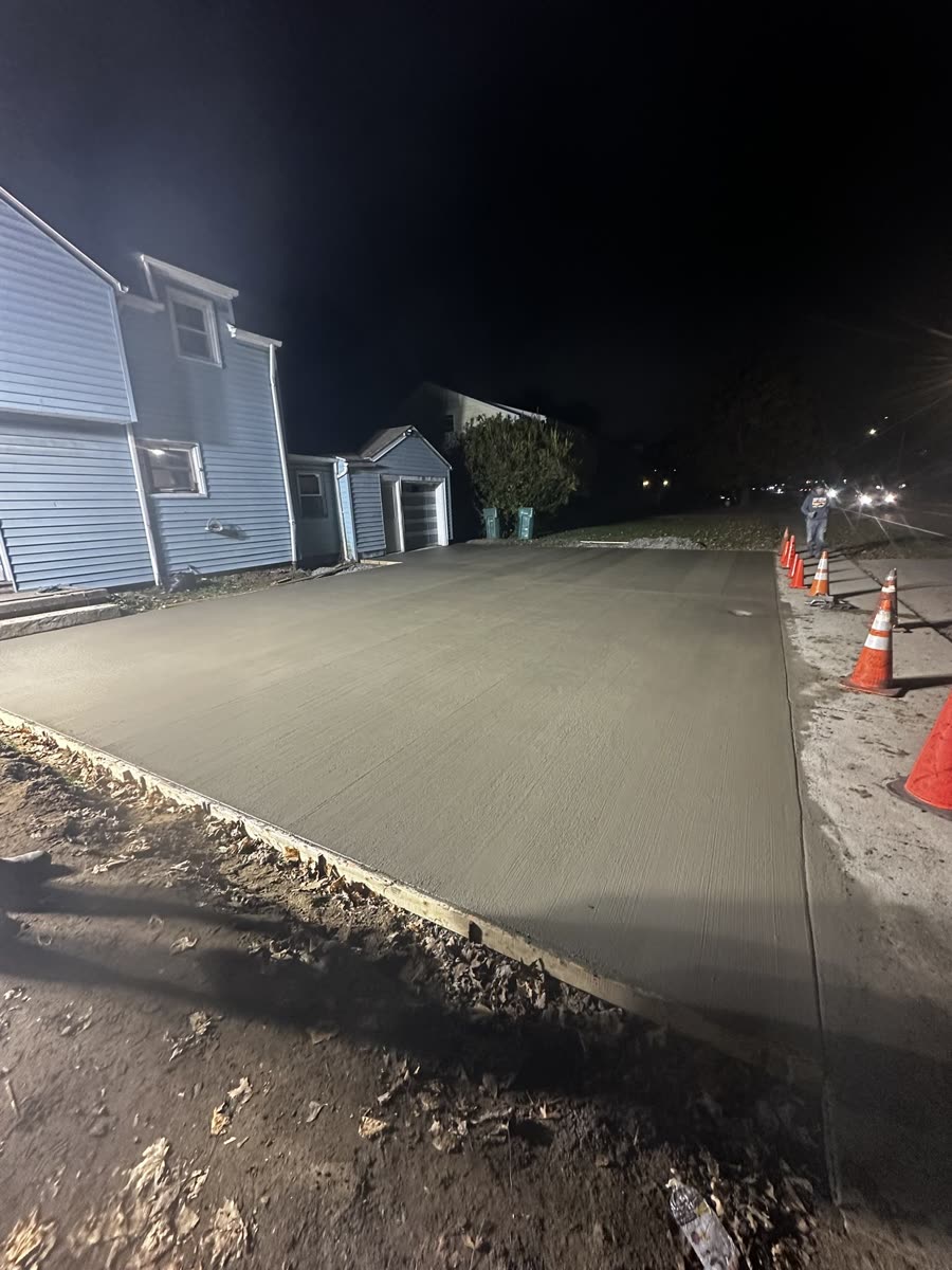 Concrete driveway nearly complete, curing — Keystone Masonry Rochester NY