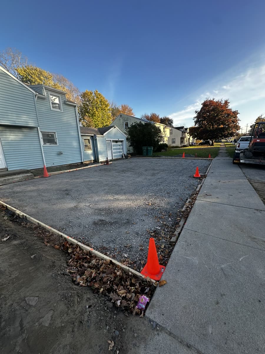 Reinforced concrete driveway form work with wire mesh grid — Keystone Masonry Rochester NY