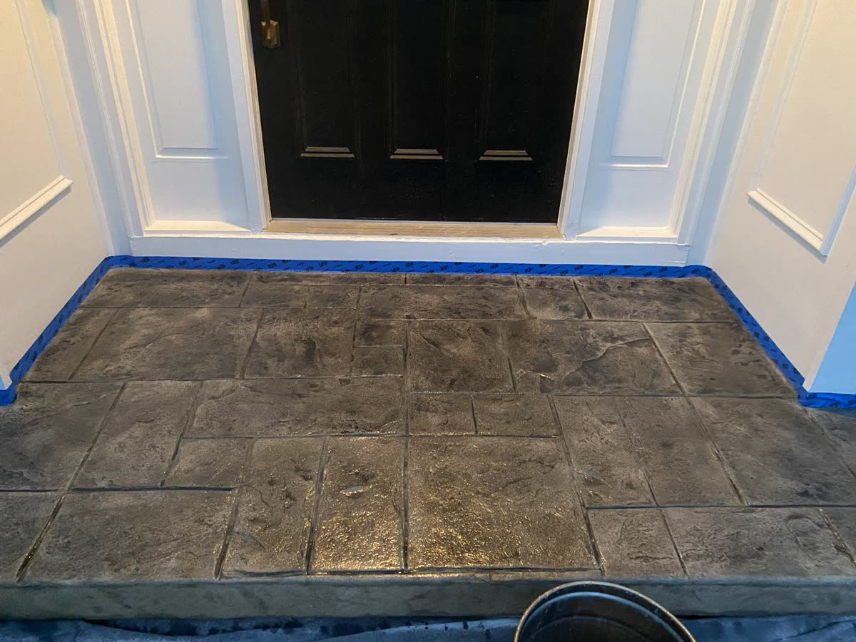 Stamped concrete front porch overlay in Pittsford NY